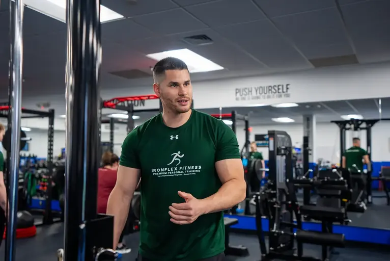 IronFlex trainer on the studio floor