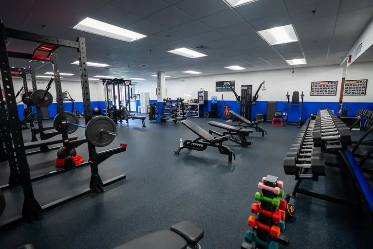 Racks and benches on the IronFlex training floor